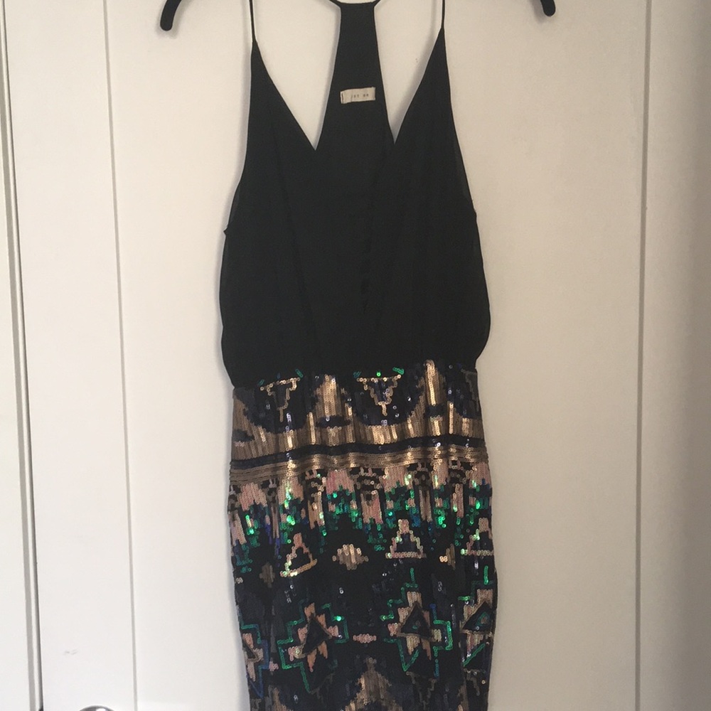 Sparkly tight dress with black loose top